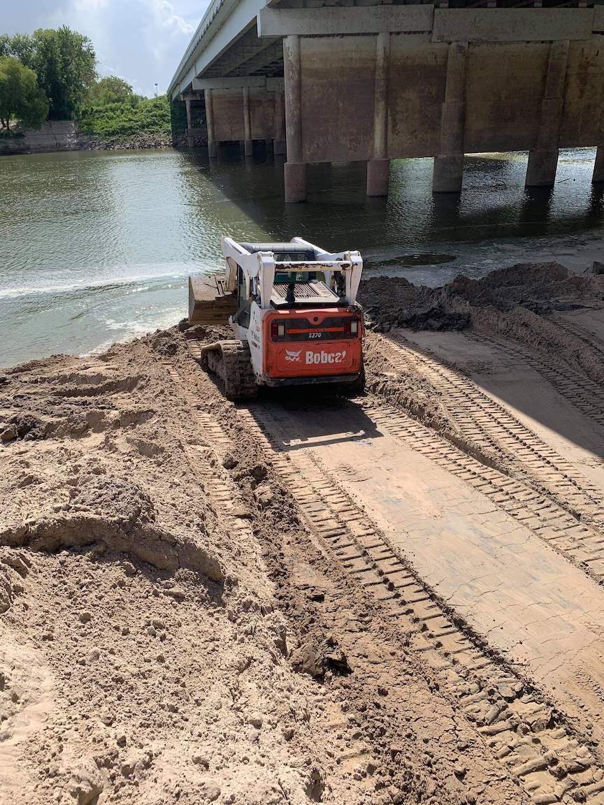 Volunteers clean up boat ramp Liberty Vindicator