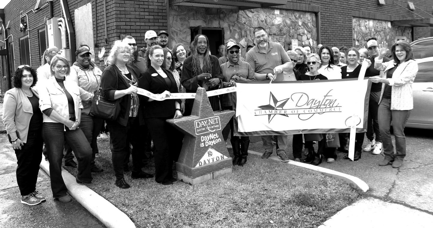 cuts ribbon at new offices Liberty Vindicator