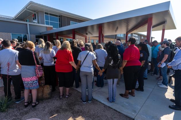 Area residents join in prayer for the victims of this weekends tragic mass shooting. Article Image Alt Text