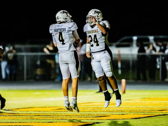Panthers quarterback Brady Barrier and Thomas Delao celebrate a big score. Article Image Alt Text