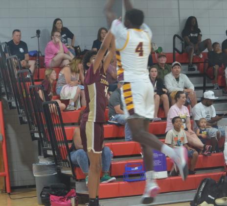 Tarkington’s Cory Armstrong takes a three-pointer over an East player on Thursday night at the SETCA All-Star Game. The Vindicator | Jerry Michalsky Article Image Alt Text