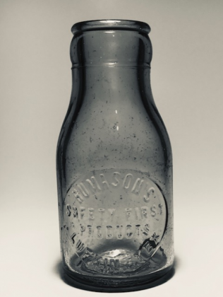 Contributed photo — A clear, embossed milk bottle from Humason's Safety First Products Lufkin, Texas. (Photo courtesy of Wayne Fults). Article Image Alt Text