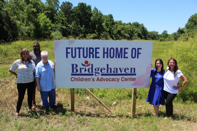 On Thursday, May 26, Bridgehaven Children’s Advocacy Center officially announced its new location in Dayton. Pictured left to right: Bridgehaven CAC Administrative Manager Angie Scruggs, Mike Nixon, Ann Rogers, Bridgehaven CAC Director Paula Torres, and Bridgehaven CAC Operations Director Rachel Ansley. Article Image Alt Text