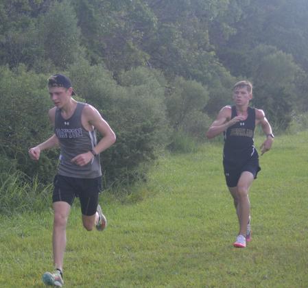 Jacob Thomas of Dayton closes in on the finish line at the Goose Creek Invitational in Baytown on Saturday morning Article Image Alt Text