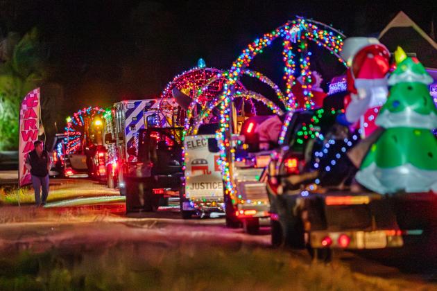 Themed “Festival of Lights,” the 20th Annual Anahuac Christmas Parade lit up the streets with the twinkling lights of holiday magic. Photo by Chris Cody Article Image Alt Text