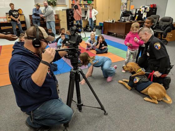 Contributed photo — Deputy K-9 Red of the Liberty County Sheriff’s Office visited San Jacinto Elementary Friday with a TV crew in tow. Article Image Alt Text