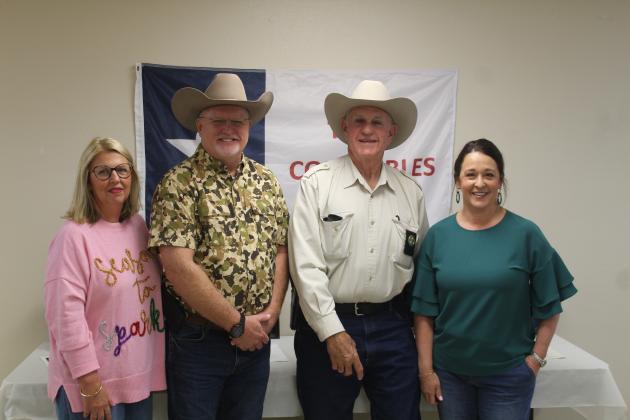 Laurie Payton, Chambers County tax collector; Chambers County Commissioner Pct. 1 Jimmy Gore; and Celia Devillier, Justice of the Peace Pct. 1, join Constable Dennis Dugat in honoring his many years of service to the county. Article Image Alt Text
