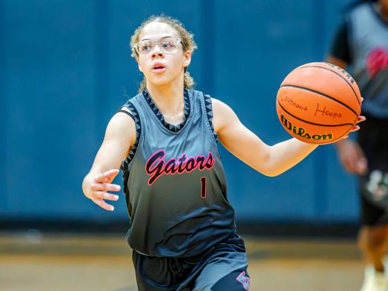 Gator Nation's Myah Humphrey looks up court on Friday night in Tomball against Covenant House in the Alodia 2025 National Championship Tournament. Article Image Alt Text