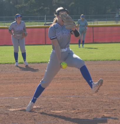 Reese Parker of Hardin delivers to the plate on Friday night at Tarkington. Article Image Alt Text