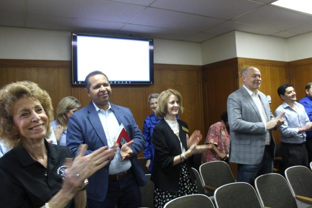 Attendees at Chambers County Commissioners Court gave a standing ovation following Commissioner Jimmy Gore’s heartfelt sentiments on County Judge Jimmy Sylvia’s retirement. Article Image Alt Text
