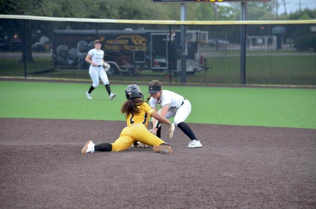 Breezy Pantalion of Liberty slides into second base with a steal against Vidor on Thursday evening. Article Image Alt Text