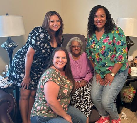 Meals on Wheels participant Elrene Anderson is shown with Community Health workers Damaris Vega, LaTricia Alvers, and Program Manager Christina Dickerson. Article Image Alt Text