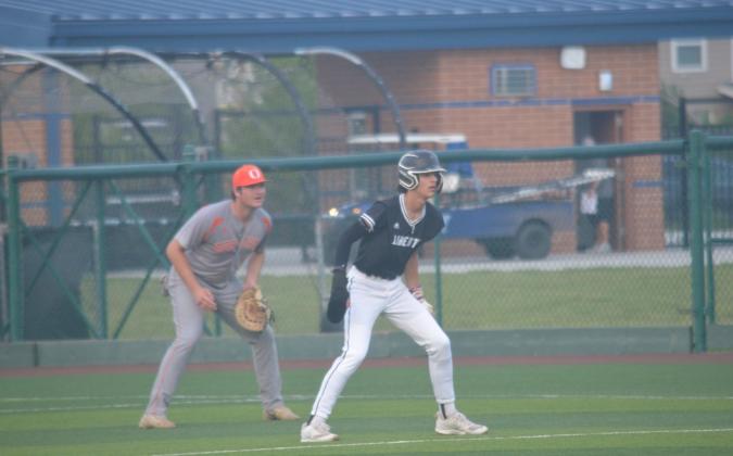 Liberty’s Jace Smart leads off of first base for the West on Wednesday night in the SETCA All-Star Game. The Vindicator | Jerry Michalsky Article Image Alt Text