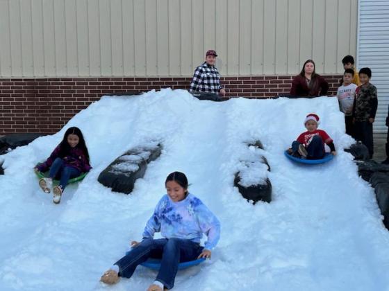 Children were all smiles while snow sledding at “Christmas in Cleveland” event at The Sanctuary of Cleveland. The Vindicator | Geovanni De Hoyos