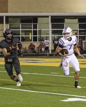 Dayton QB Blayne Denton looks for running room against Texas City. The Vindicator | Amanda Jordan Article Image Alt Text