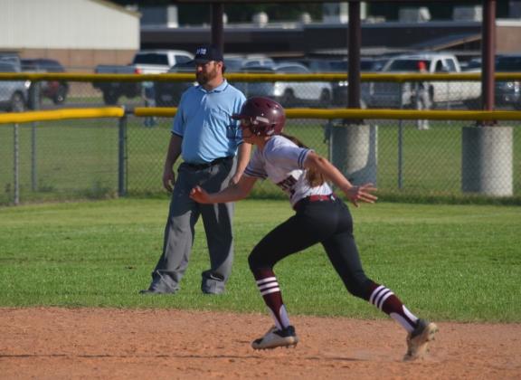 Tarkington’s Savannah West takes off for third base in a district tilt on Tuesday evening at home against Coldspring. The Vindicator | Jerry Michalsky Article Image Alt Text