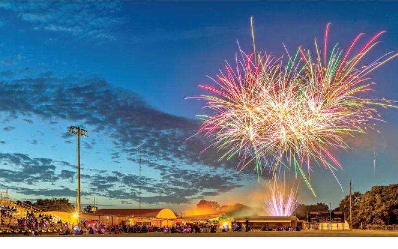 Fireworks light up the night sky over Daisetta’s Bobcat Stadium during the Stars, Stripes and Fireworks on the Field, organized by Daisetta and HD N.E.A.T. Photo by Chris Cody