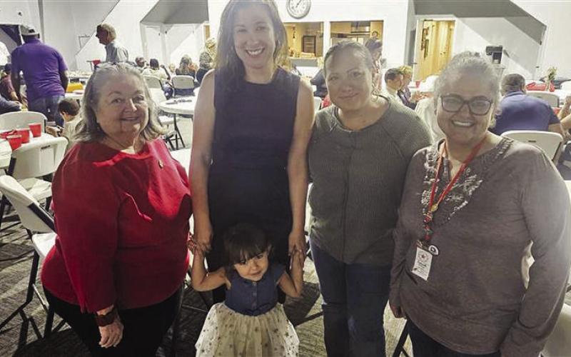 Liberty County Republican Women’s Club Vice President Billie Williams (left), Treasurer Emily Cook, Secretary Lana McCarty, and President Sarah Vickery, along with Abigail Cook (center), at the club’s Friendsgiving event. Photos by Russell Payne
