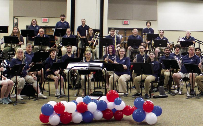 The DCamp Family Band prepares to perform at Dayton’s Hometown Celebration in the Dayton Community Center, with assistance from Dayton and Liberty school bands. Photo by Celeste Denova