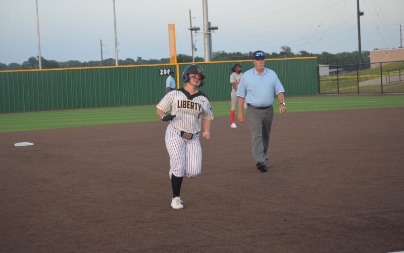Liberty's Kamdyn Chandler rounds the bases after her game-tying home run in the sixth inning during game one against Lake Belton. 